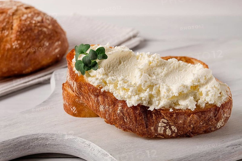 Sandwich, with cream cheese, homemade, on a cutting board, rustic style, no people, selective focus, breakfast