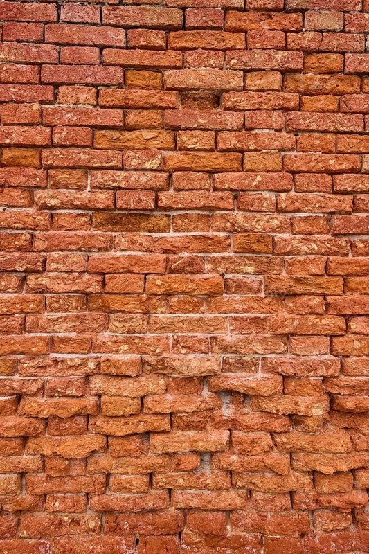 Detail of an old ziggurat wall made of bakestone bricks, Venice Italy