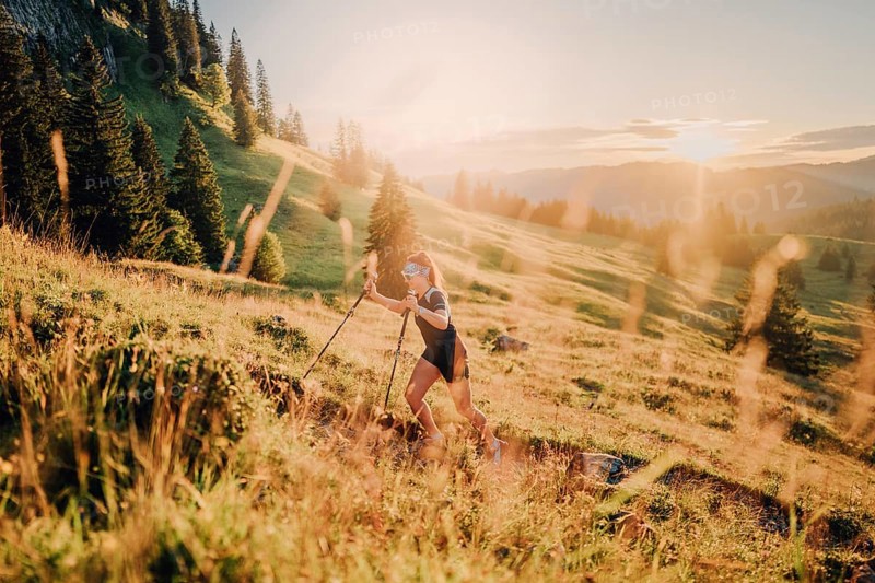Summer trail running and hiking in the Alps on the Riedberg Pass between Obermaiselstein and Balderschwang in the Allgäu, Bavaria, Germany, Europe