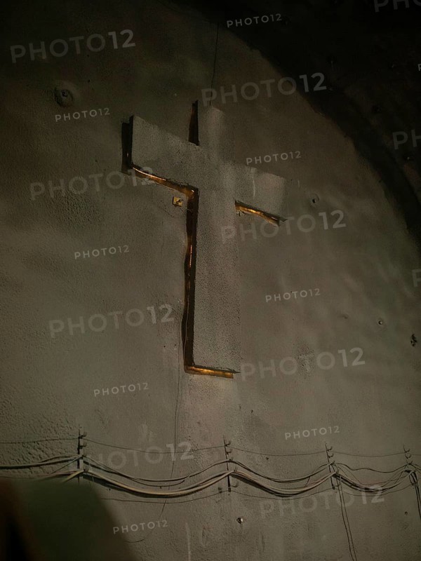Cross at one end of the tunnel, installed for the Saint Barbara celebration on 4 December 2023, patron saint of miners, in construction lot H53, Brenner Base Tunnel, Wolf, Tyrol, Austria, Europe
