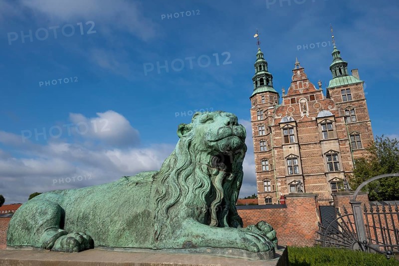 Bronze lion sculpture in front of Rosenborg Palace, 17th century royal palace and museum, Kongens Have Park, Copenhagen, Denmark, Europe