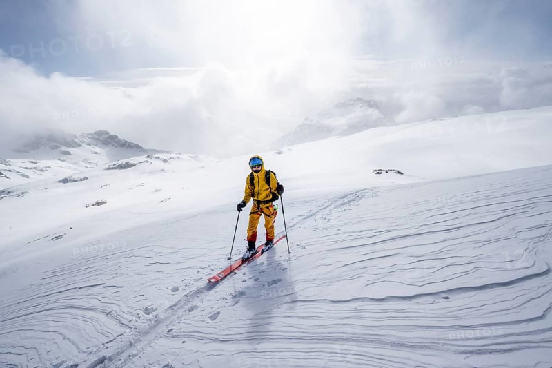 Ski tourers in a snowy mountain landscape, ascent to the Wildhorn, cloudy mood, high tour, Bernese Alps, Bernese Oberland, Switzerland, Europe