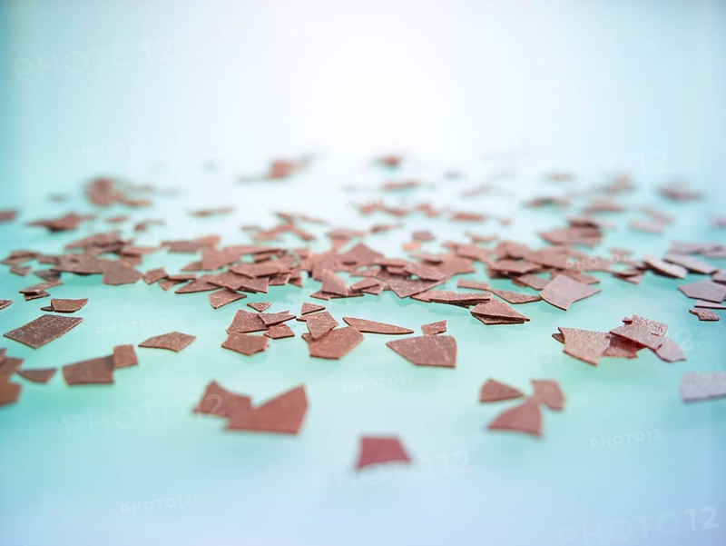 Chocolate chips as sprinkle decoration for decorating ice cream, cakes and muffins, studio photo