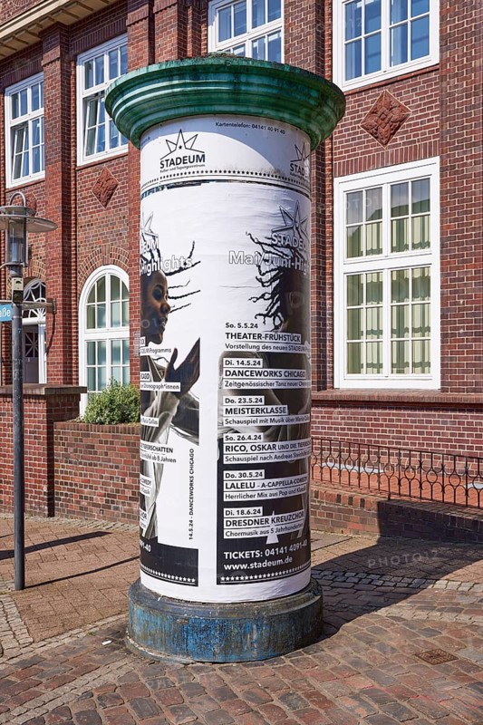 Advertising pillar with advertisement of the Stadeum at the Bahnhofstrasse in the city centre of Stade, Hanseatic city, district of Stade, Lower Saxony, Germany, Europe