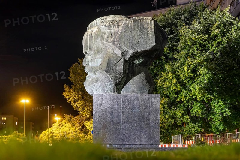 Karl Marx Monument at night. 40 tonne sculpture, the most famous landmark of the city of Chemnitz, Saxony, Germany, Europe