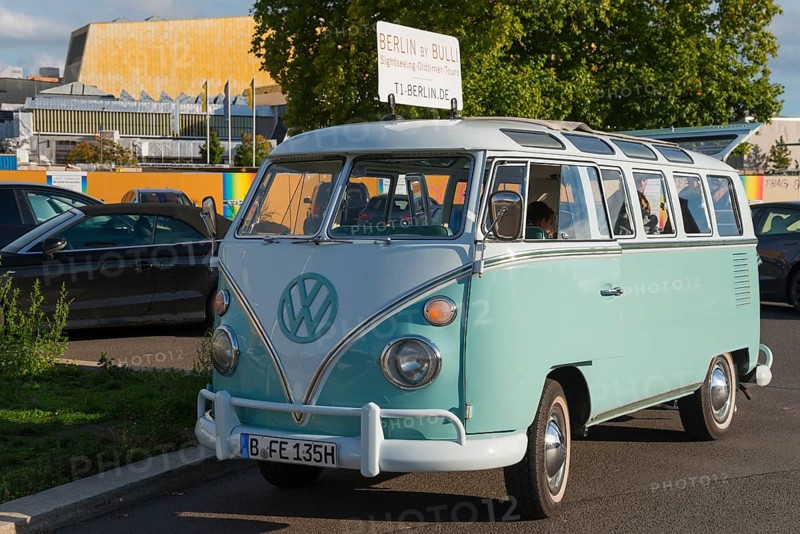 Mint green VW vintage bus on a street in Berlin, retro style, city tour with VW Bulli, VW T1, Berlin, Germany, Europe