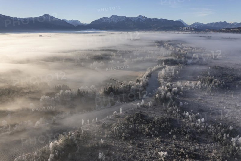 Aerial view of a moor landscape with river in front of mountains in winter, hoarfrost, morning light, view of Bavarian Alps, Loisach, Alpine foothills, Bavaria, Germany, Europe