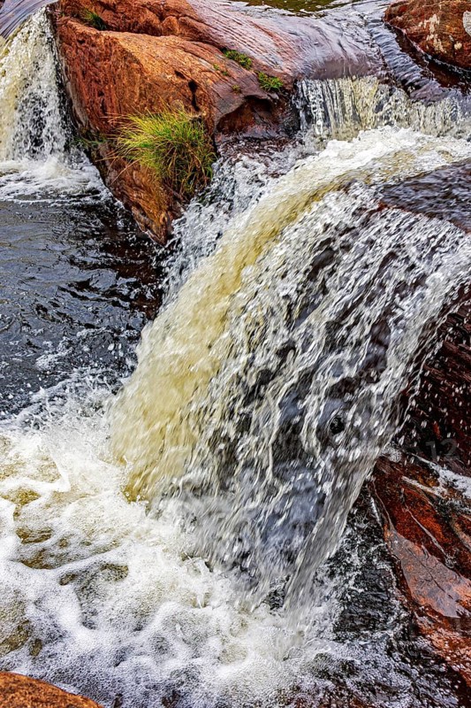 Small river and waterfall among the rocks of the Biribiri mountain range in Diamantina, Minas Gerais, Diamantina, Minas Gerais, Brazil, South America
