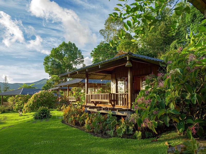 Wooden bungalows in a green garden, Tomohon, Manado, Sulawesi