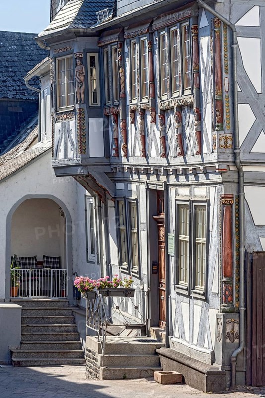 Duchscherer Haus, historic half-timbered house from the early Baroque period, façade with bay window and colourful painted carvings, decor, colourful, old town, Hadamar, Limburg-Weilburg, Westerwald, Hesse, Germany, Europe