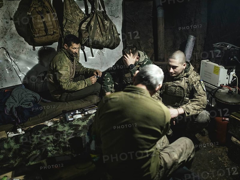 Iura, Volodymyr, Daniel and Ruslan wait with a 122 mm artillery gun from Soviet stocks for the order to deploy. Normally they are in position for a month. This time, however, they have been waiting longer for relief, near Kupyansk, Ukraine, 2024, Europe