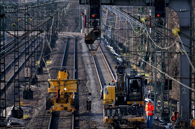 Labourers working with Liebherr A922 Rail Litronic and Kuhnle RR14 EVO 3 Rail two-way working platform on rails, line closure, construction site implementation Digital node between Waiblingen and Bad Cannstatt, Stuttgart, Baden-Württemberg, Germany, Europe