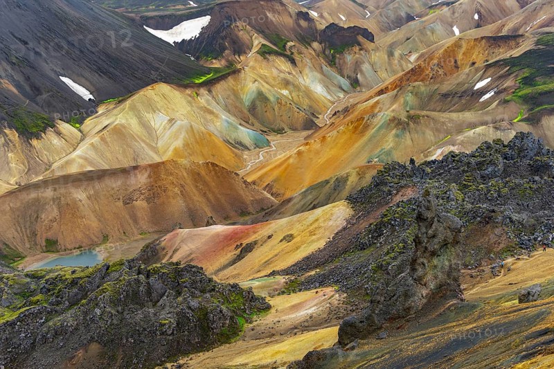 Small river between colourful rhyolite mountains, volcanic landscape, erosion landscape, view from Brennisteinsalda Landmannalaugar, Fjallabak Nature Reserve, Icelandic Highlands, Suðurland, Iceland, Europe
