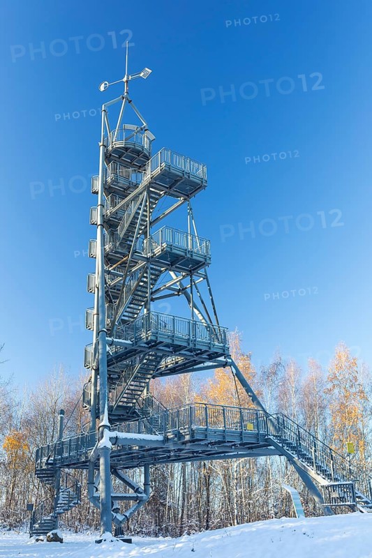 Glückauf tower in the snow, spoil heap from the former Deutschlandschacht in Oelsnitz in the Ore Mountains, Saxony, Germany, Europe