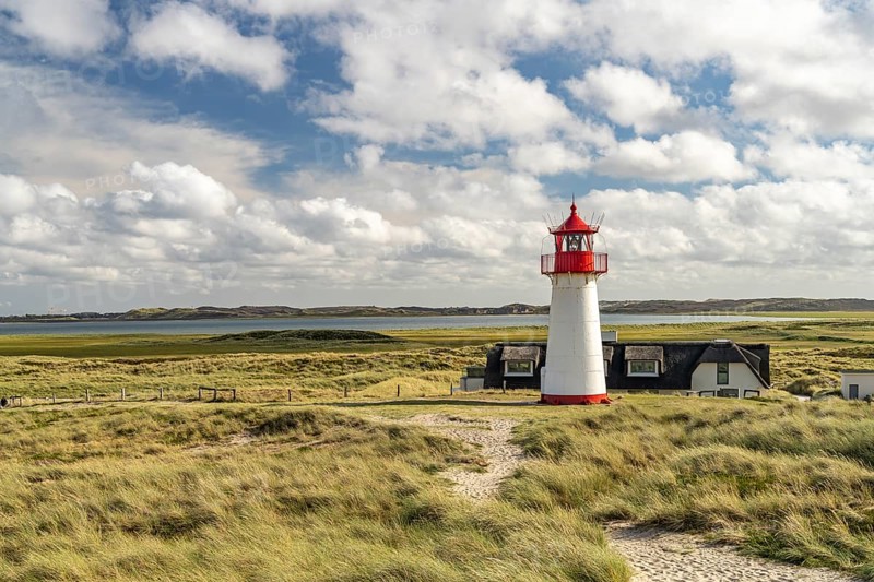 The List West lighthouse on the coast of the Ellenbogen peninsula, List, island of Sylt, district of North Friesland, Schleswig-Holstein, Germany, Europe
