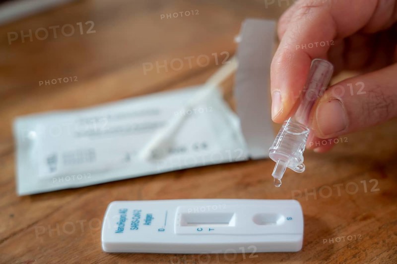 Corona antigen rapid test, lay test, self-test, for the detection of SARS-CoV-2 infection, sprinkle the test cassette with the solution of the nasal swab