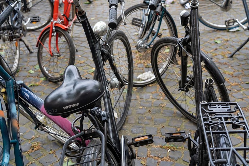 Large bicycle car park in front of the main railway station in, removed saddle, theft protection, Münster, North Rhine-Westphalia, Germany, Europe