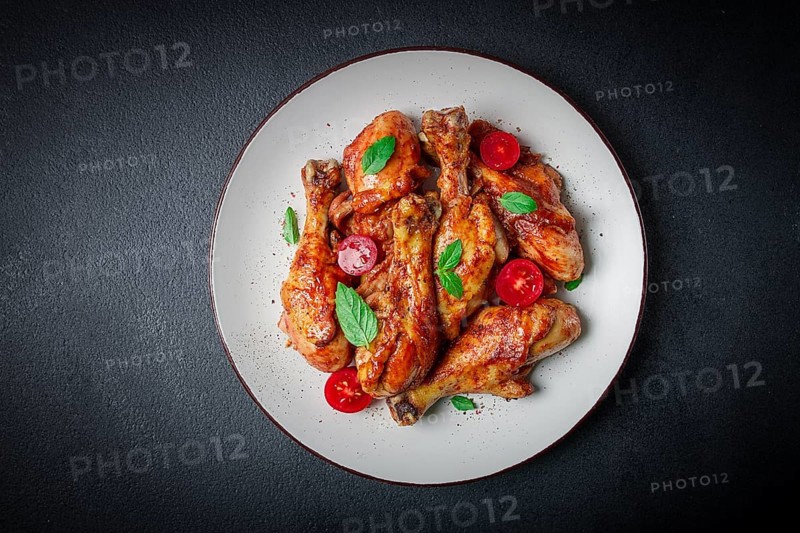 Fried chicken legs, in soy sauce, spices, herbs, top view, homemade