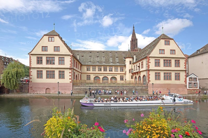 Musée historique, historical museum and river Ill with boat traffic, sightseeing, tourism, city tour, church tower of the UNESCO cathedral, Grande Île, Strasbourg, Bas-Rhin, Alsace, France, Europe