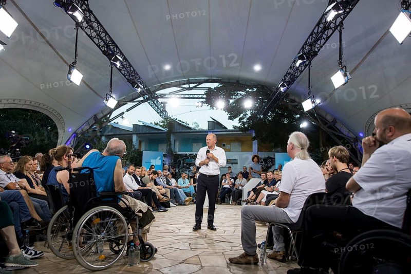 Olaf Scholz (Chancellor of the Federal Republic of Germany, SPD) surrounded by guests at the Chancellor's meeting at ufaFabrik in Berlin on 4 September 2024