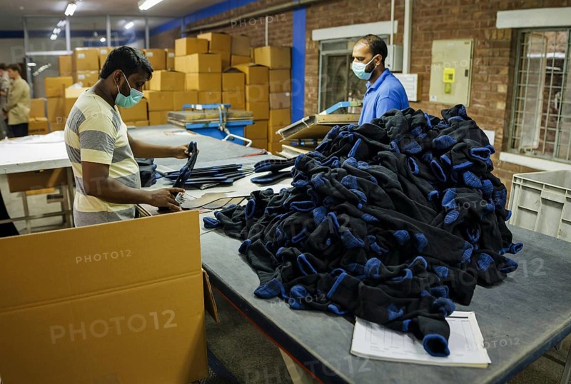 Employees of Inter Market Knit Private Limited producing socks. Lahore, 22.08.2024. Photographed on behalf of the Federal Ministry for Economic Cooperation and Development