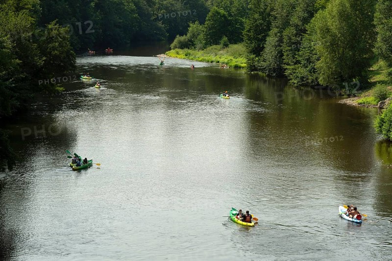 Canoeing on the Allier River in Chilhac, Haute-Loire, showcasing a popular outdoor activity in Auvergne-Rhône-Alpes, France, Europe