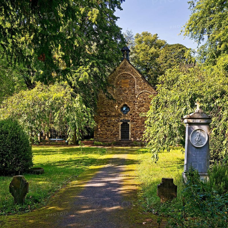 Grave monuments in front of St George's Chapel, Old Cemetery, Bonn, North Rhine-Westphalia, Germany, Europe
