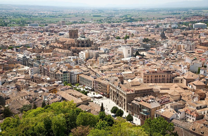 View of city centre and historic Moorish buildings in the Albaicin district of Granada, Spain seen from the Alhambra
