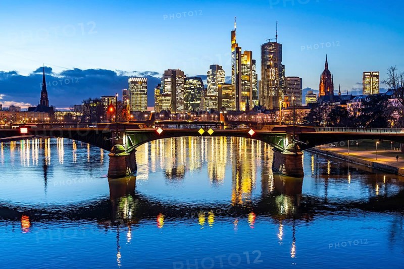 Skyline of the city centre of Frankfurt am Main, river Main, dusk, Ignatz-Bubis-Brücke, Hesse, Germany, Europe