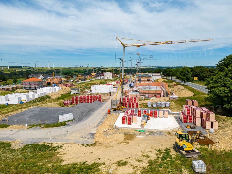 New development area near Bad Wünnenberg, construction sites of various detached houses and apartment blocks, North Rhine-Westphalia, Germany, Europe