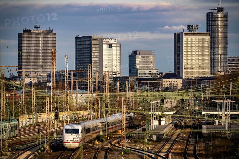 Train on the tracks west of Essen central station, skyline of the city centre, ICE train, North Rhine-Westphalia, Germany, Europe