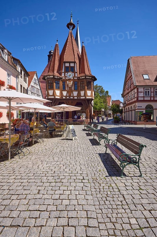 Market square with historic town hall, benches and outdoor area of a café in Michelstadt, Odenwald, Odenwaldkreis, Hesse, Germany, Europe