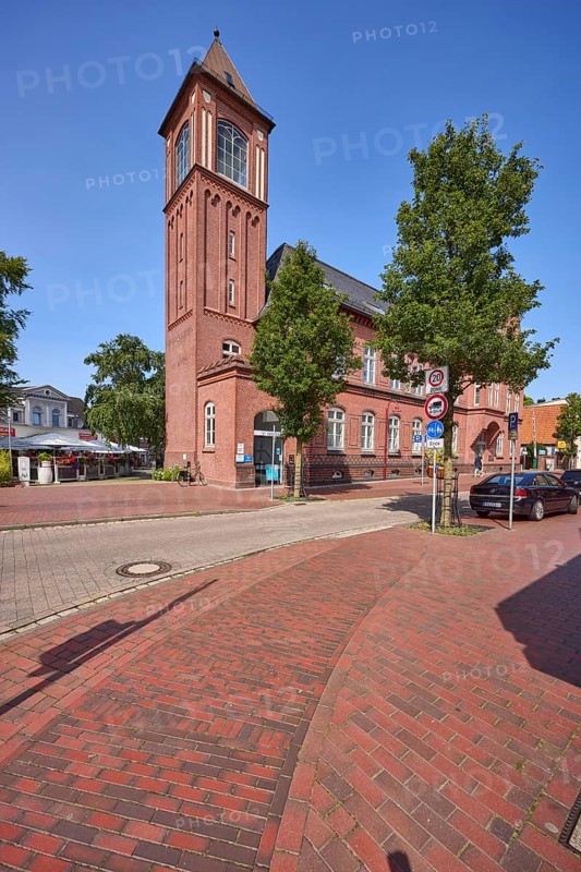 Old post office with brick tower in Varel, district of Friesland, Lower Saxony, Germany, Europe