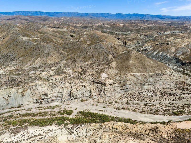 Wide valley in dry mountain landscape with sparse vegetation, aerial view, Tabernas Desert, Desierto de Tabernas, Tabernas, Almeria, Andalusia, Spain, Europe