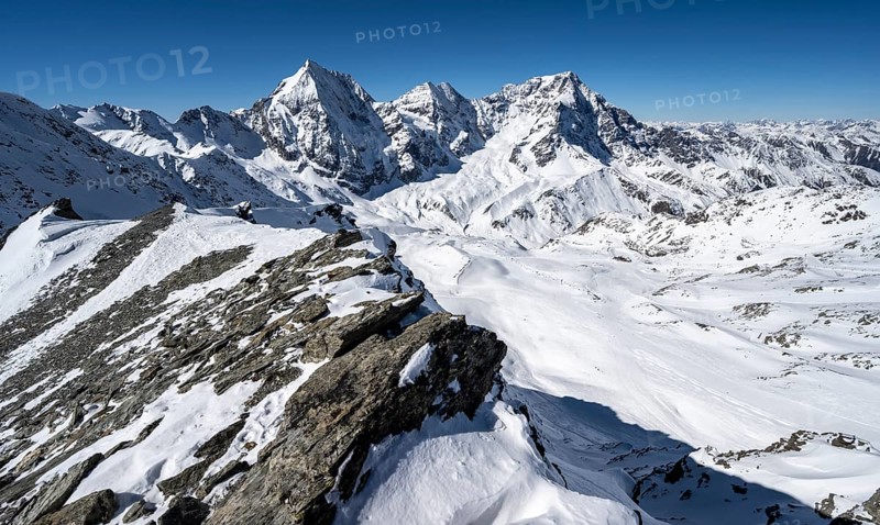 Mountain panorama with snow-covered mountain landscape in winter, view of mountain peaks Königsspitze, Monte Zebru and Ortler, summit of Madritschspitze, Ortler Alps, Vinschgau Valley, Italy, Europe