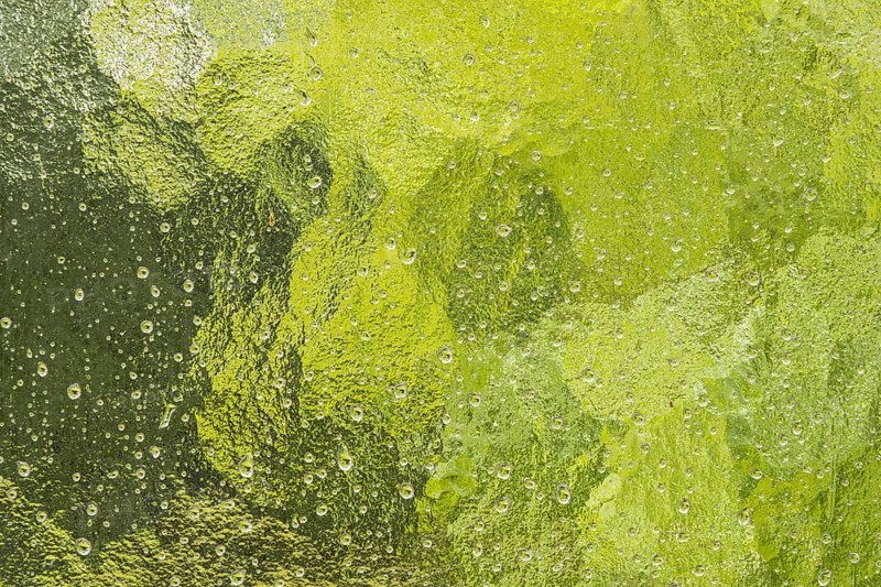 Raindrops, frosted glass pane