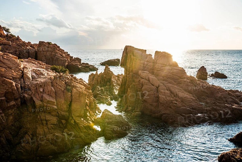 Red rocks and sea, Spiaggia Su Sirboni, sunrise, near Tertenia, Province of Ogliastra, Sardinia, Italy, Europe