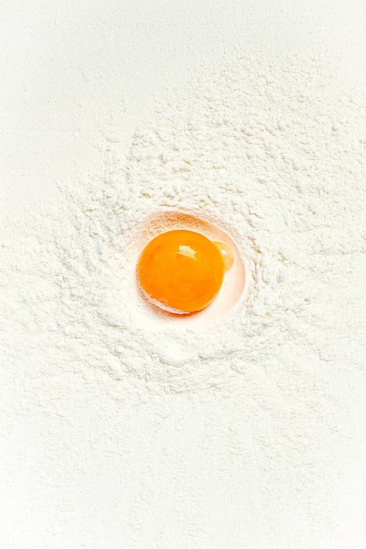 Flour, with egg yolk, texture, food background, top view, pasta, no people