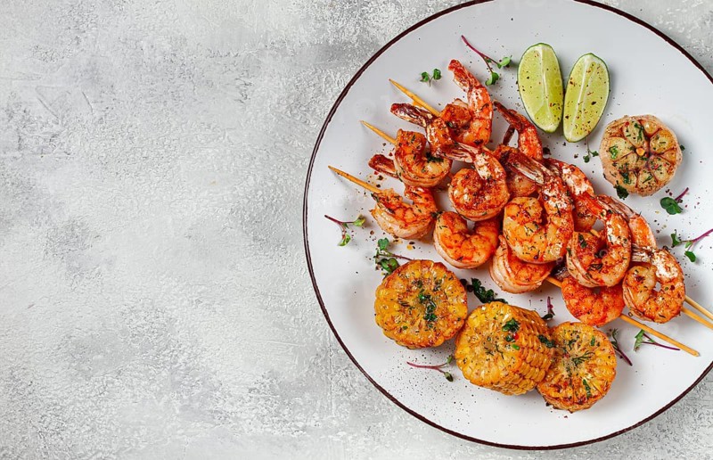 Tiger prawns on skewers, shrimp kebab, with corn, fried, homemade, no people