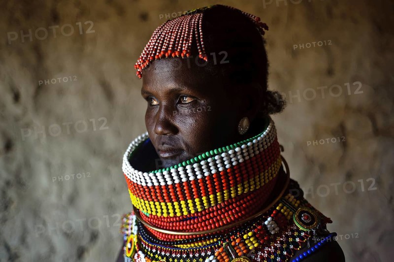 Portrait of a woman from the Turkana tribe, Kenya. She is adorned with traditional beadwork