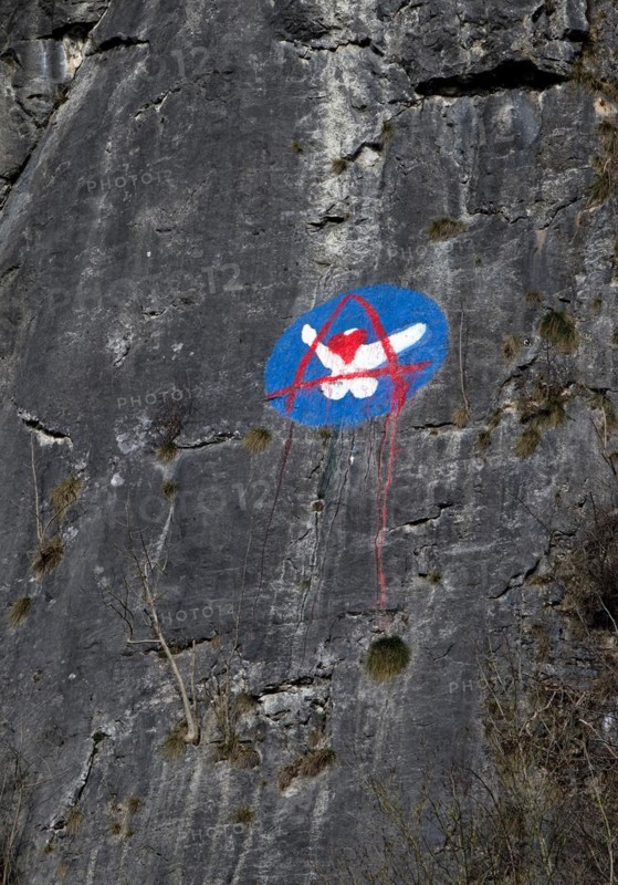 Steep rock face made of mass limestone with painting, Hönnetal, Balve, Sauerland, North Rhine-Westphalia, Germany, Europe