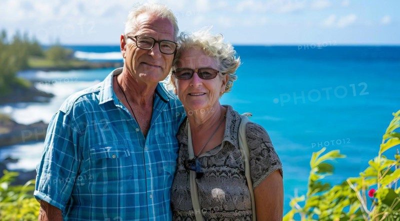 Healthy and happy active senior couple enjoying retirement close to a beach property, AI generated