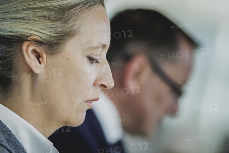 (L-R) Alice Weidel, Federal Chairwoman of the AfD (Alternative for Germany), and Tino Chrupalla, Federal Chairman of the AfD (Alternative for Germany), speak to the media in front of the parliamentary group meeting in Berlin, 23 April 2024
