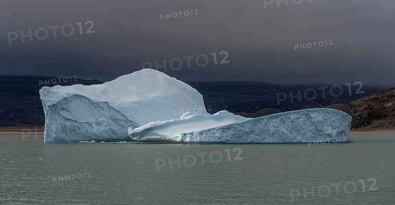 Floating iceberg, Scoresbysund or Kangertittivaq in Greenlandic, the largest and longest fjord system in the world, East Greenland, Greenland, North America