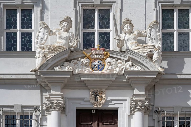 Entrance potal with sculptures and coat of arms of the baroque town hall, built in 1718, Iphofen, Lower Franconia, Bavaria, Germany, Europe