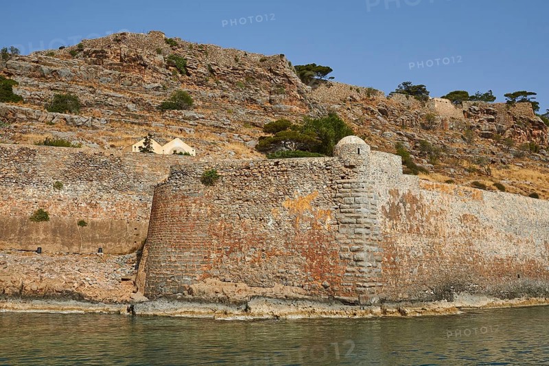 Historic stone wall on the coast with rocky landscape and sea view, Venetian sea fortress, Leper Island, Spinalonga, Elounda Bay, Mirabello Bay, East Crete, Crete, Greek Islands, Greece, Europe