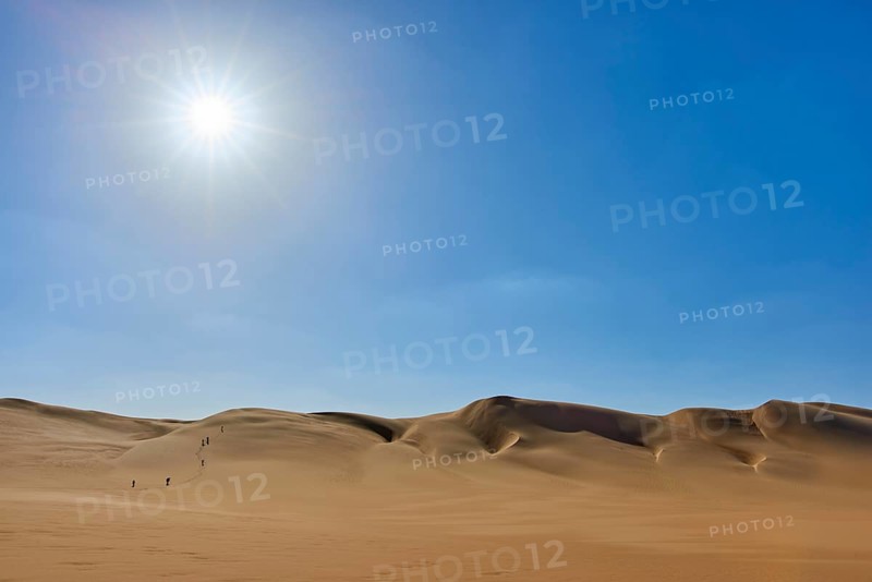 Sunny desert landscape with sand dunes tourist group, under clear blue sky, Matruh, Great Sand Sea, Libyan Desert, Sahara, Egypt, North Africa, Africa