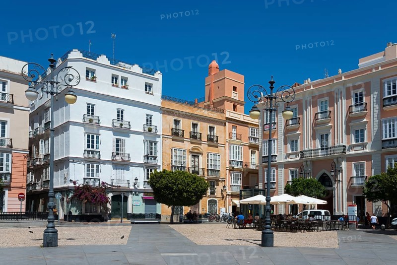 Urban square with colourful historic buildings and trees under a blue sky, Plaza de San Antonio, Old Town, Cádiz, Cadiz, Andalusia, Spain, Europe