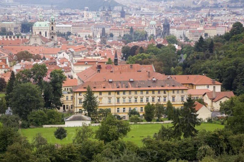 Prague Castle district skyline and buildings with traditional terracotta ceramic tiled rooftops Prague, Czech Republic, Europe