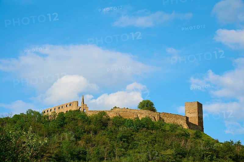 A castle ruin on a wooded hill under a blue sky with clouds, Gleichen Castle or Wanderslebener Gleiche, Drei Gleichen, Thuringia, Germany, Europe